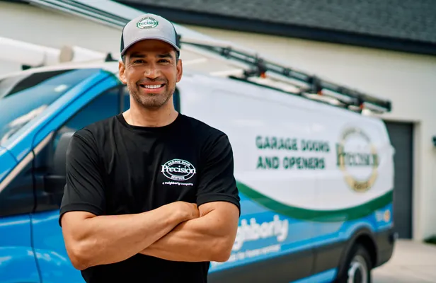 Technician in front of a service van